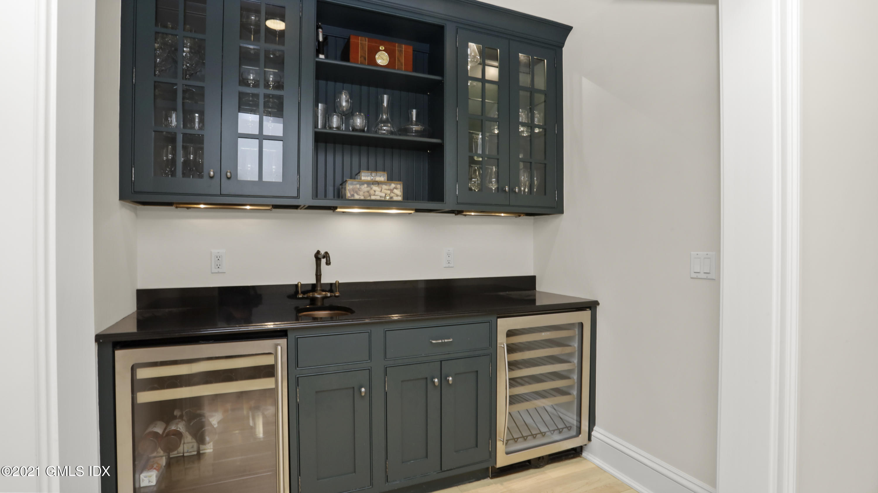 44 Glen Avon Drive Riverside, CT 06878 - Photo 17 of 39 a kitchen with granite countertop a sink and cabinets