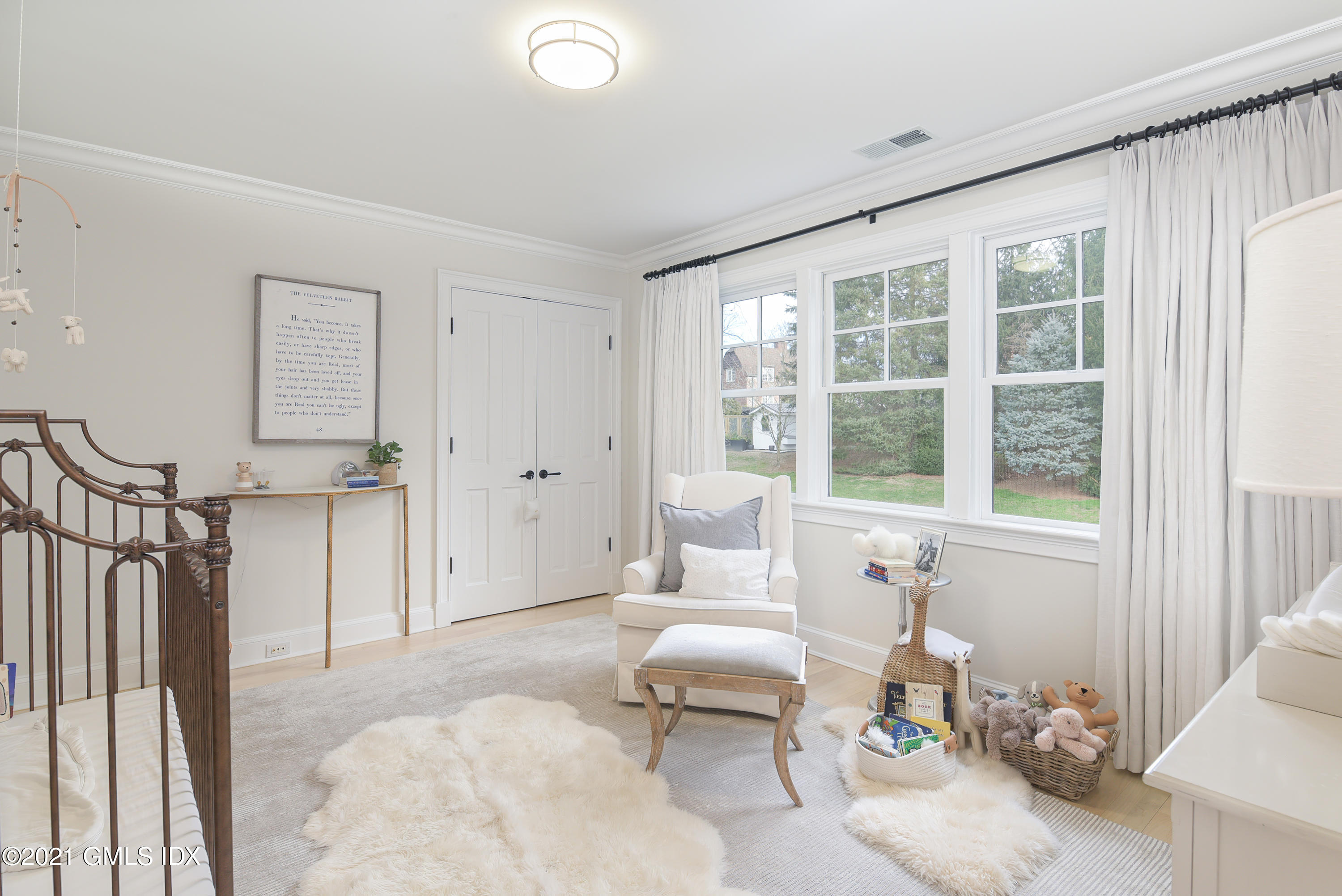 44 Glen Avon Drive Riverside, CT 06878 - Photo 21 of 39 a living room with furniture and a large window
