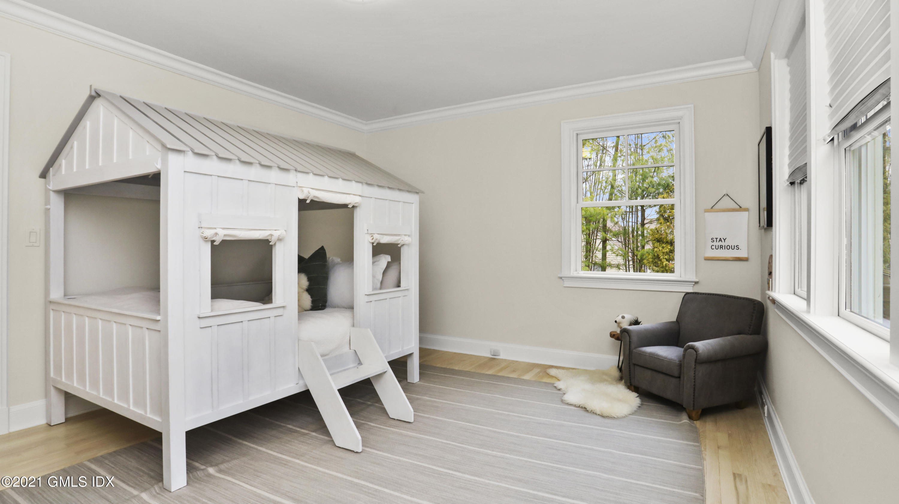 44 Glen Avon Drive Riverside, CT 06878 - Photo 22 of 39 a living room with furniture and a window