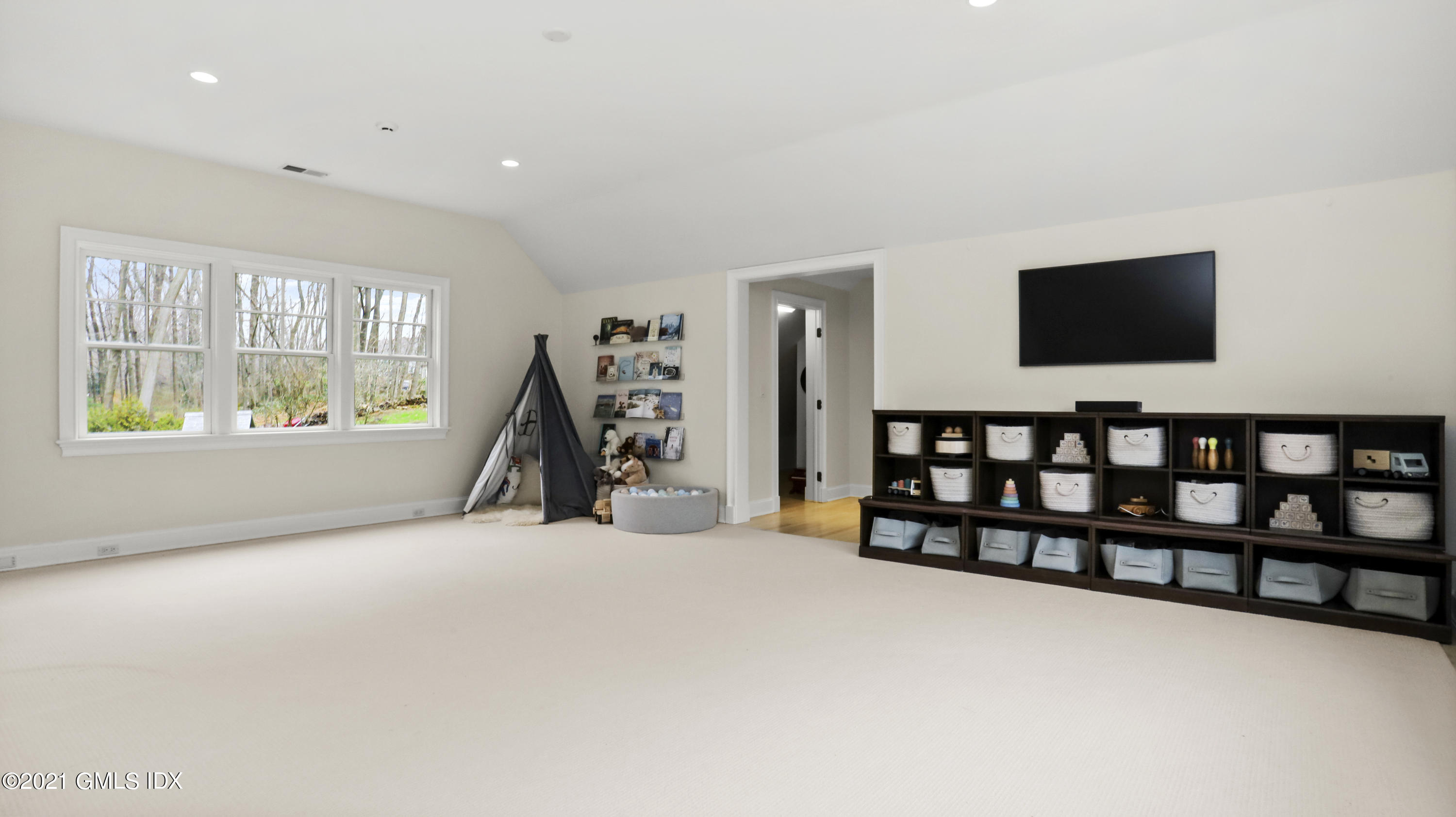 44 Glen Avon Drive Riverside, CT 06878 - Photo 25 of 39 a view of an empty room with furniture and a window