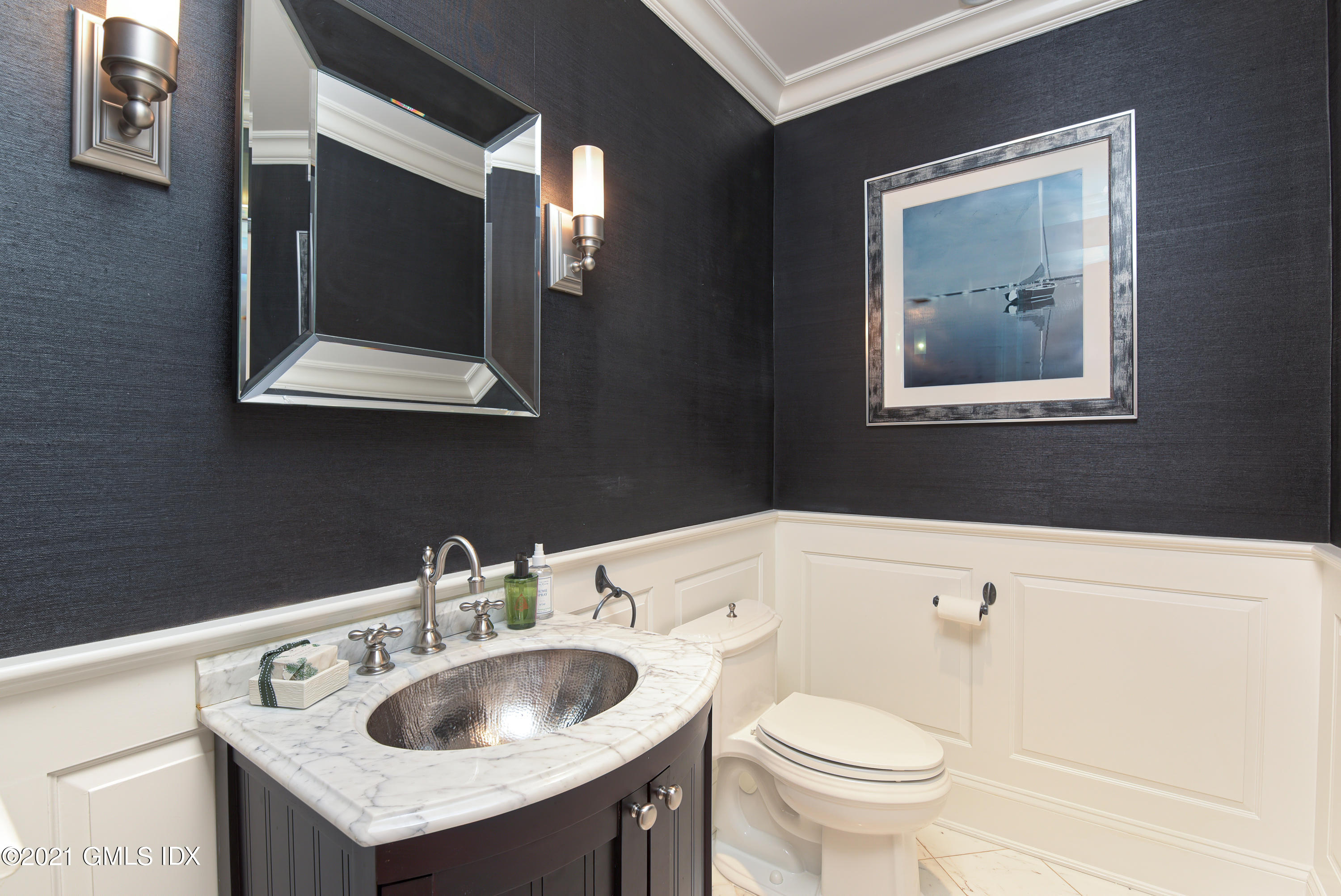 44 Glen Avon Drive Riverside, CT 06878 - Photo 8 of 39 a bathroom with a toilet sink and mirror