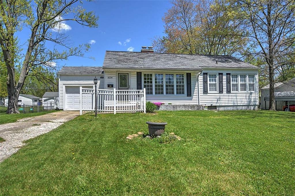 3234 East Fulton Avenue Decatur, IL 62521 - Photo 1 of 1 a view of a house with a yard and sitting area