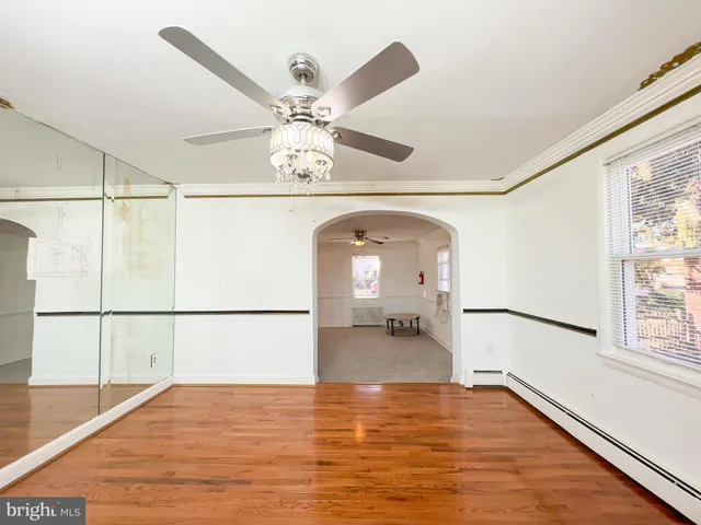 a view of a living room with a large window