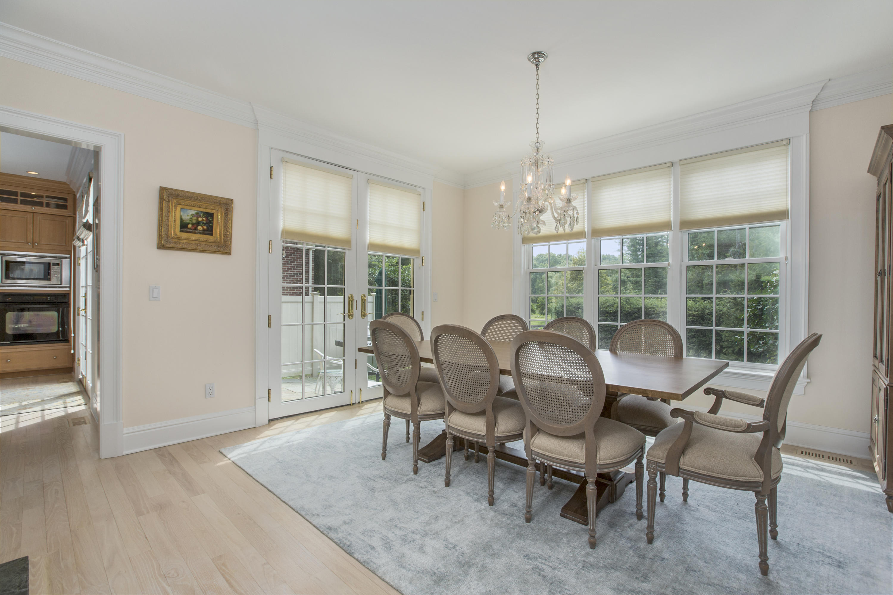 30 Richmond Hill Road, Unit 4 New Canaan, CT 06840 - Photo 12 of 40 a view of a dining room with furniture window and outside view