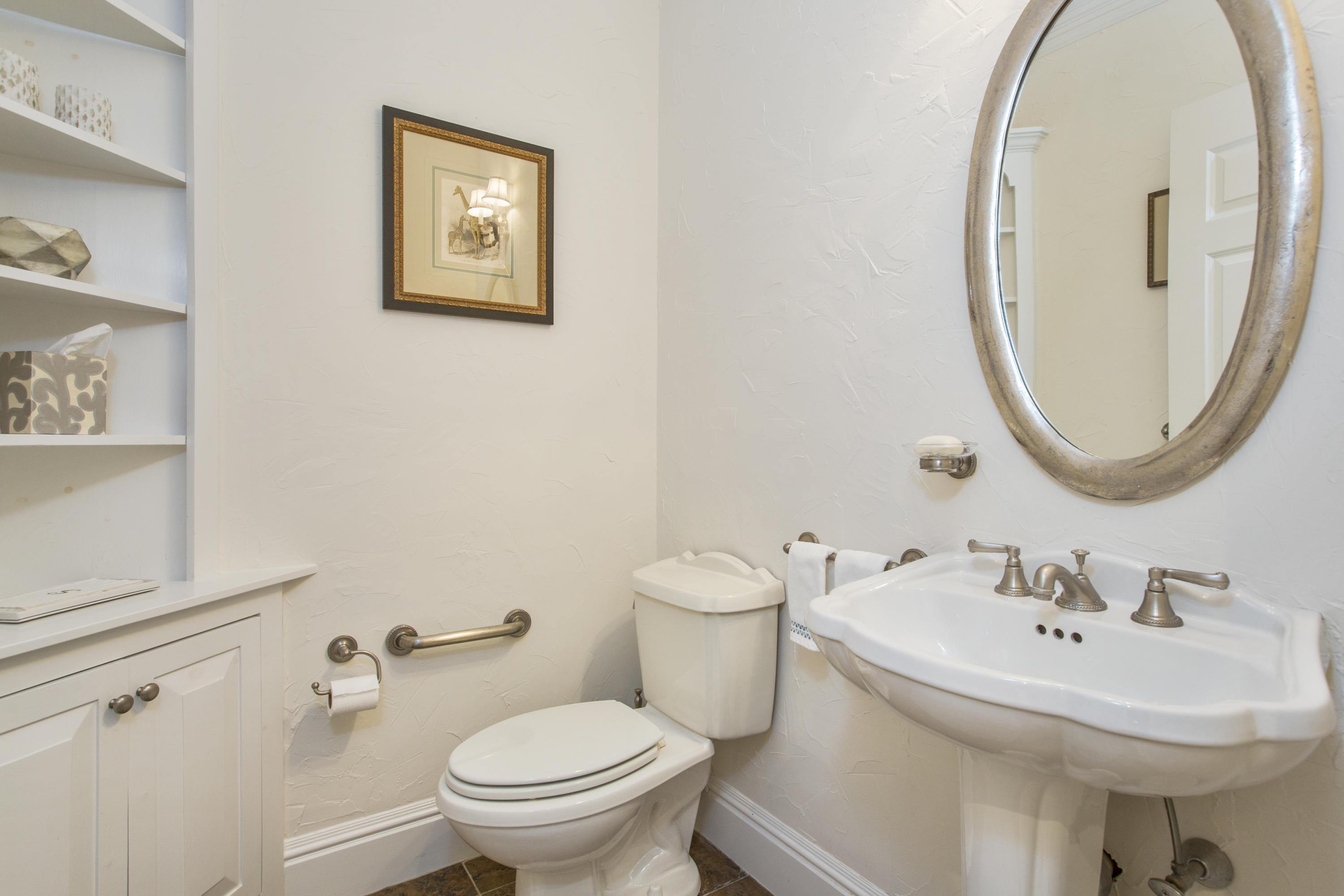 30 Richmond Hill Road, Unit 4 New Canaan, CT 06840 - Photo 16 of 40 a bathroom with a sink and a mirror