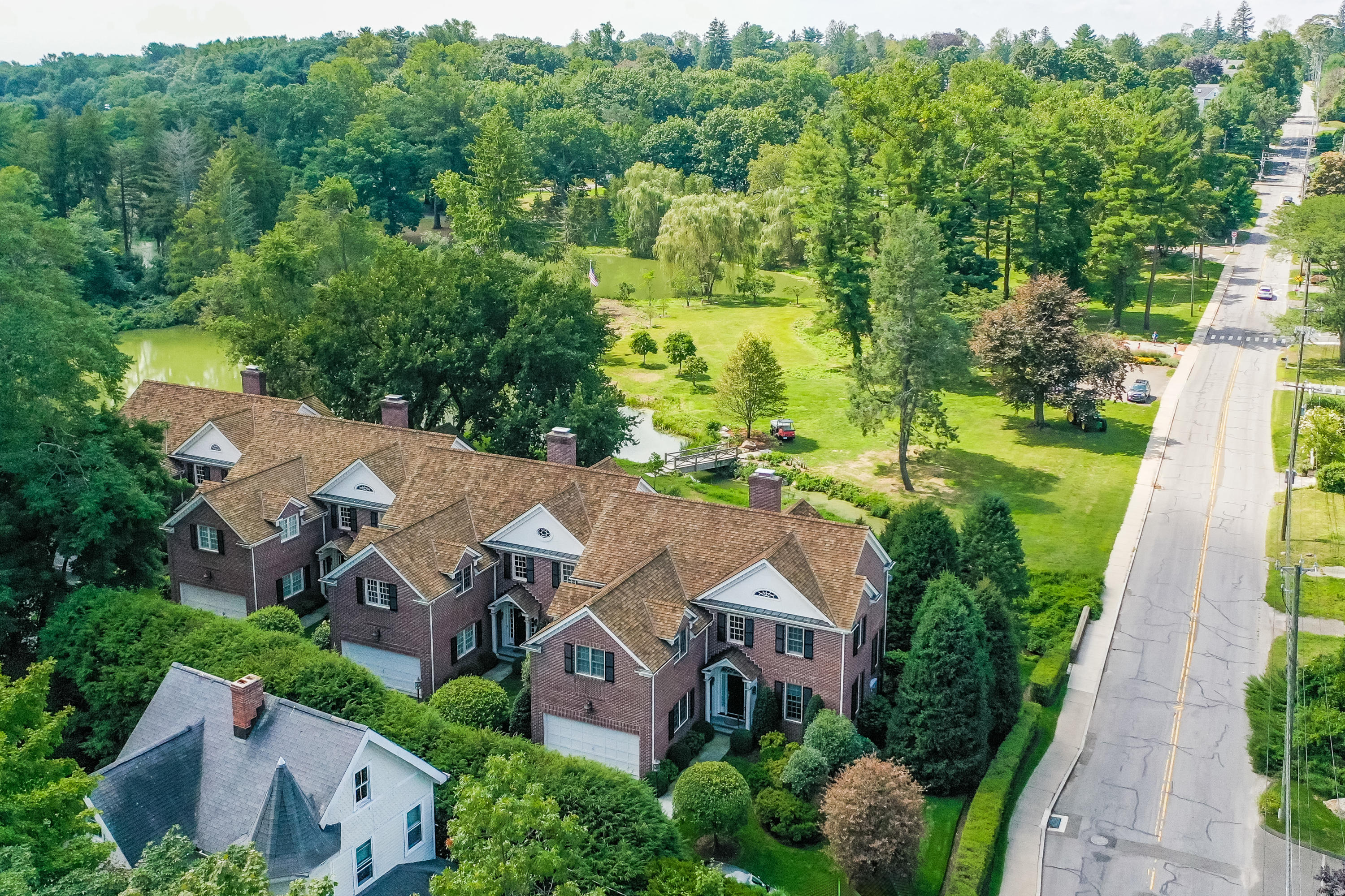 30 Richmond Hill Road, Unit 4 New Canaan, CT 06840 - Photo 2 of 40 an aerial view of a house with a yard