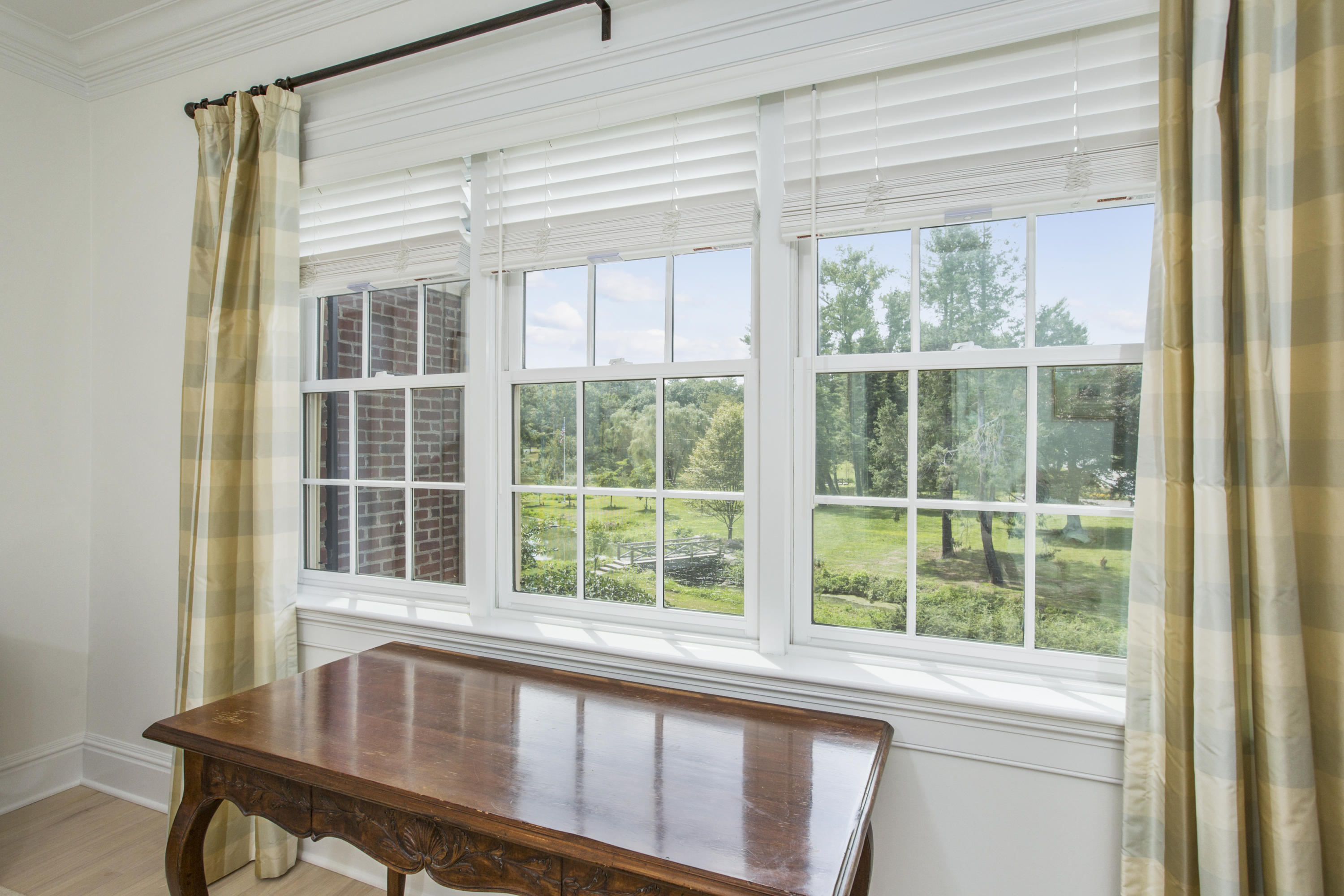 30 Richmond Hill Road, Unit 4 New Canaan, CT 06840 - Photo 22 of 40 a view of a large window with outside view