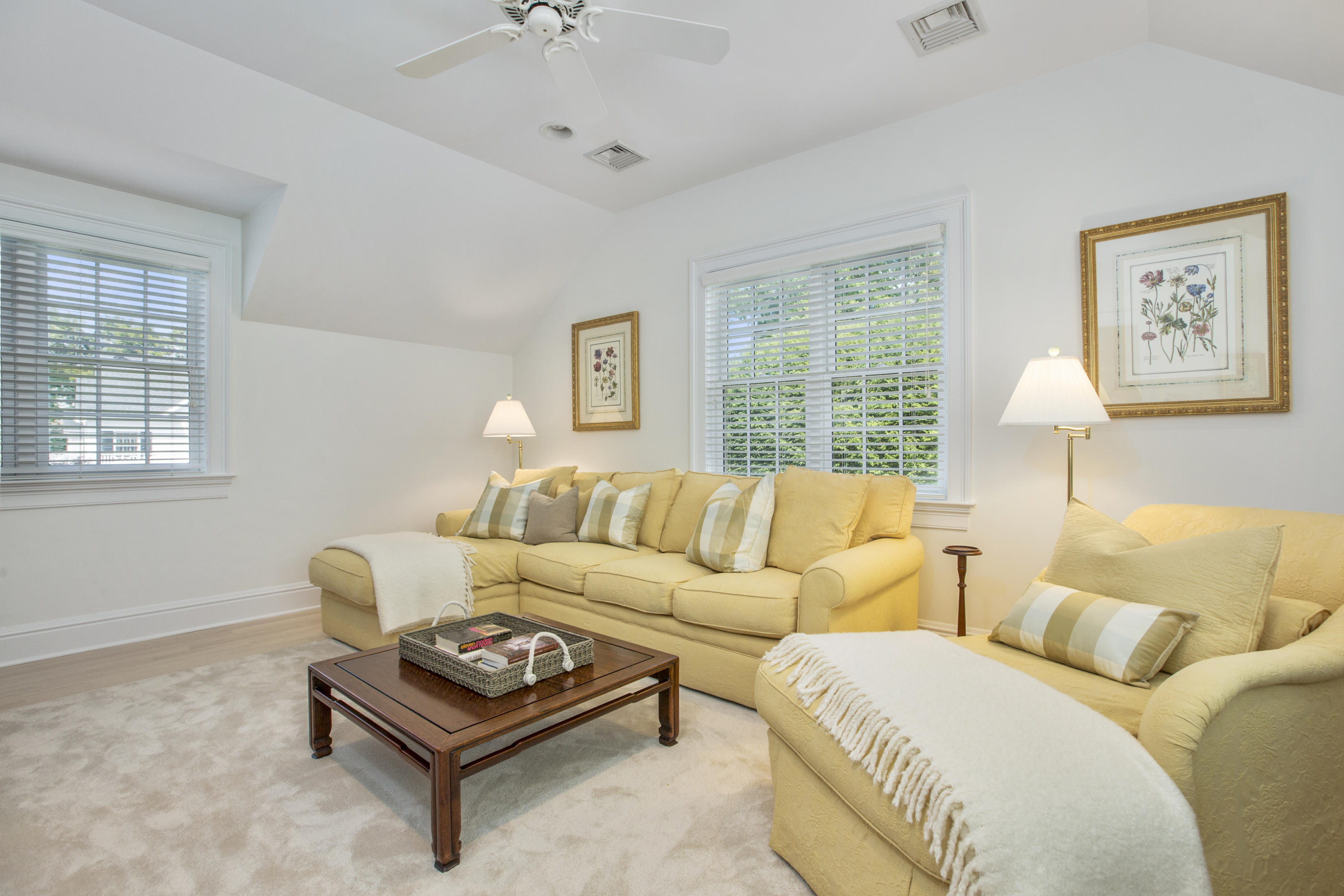 30 Richmond Hill Road, Unit 4 New Canaan, CT 06840 - Photo 24 of 40 a living room with furniture a bed and a couch