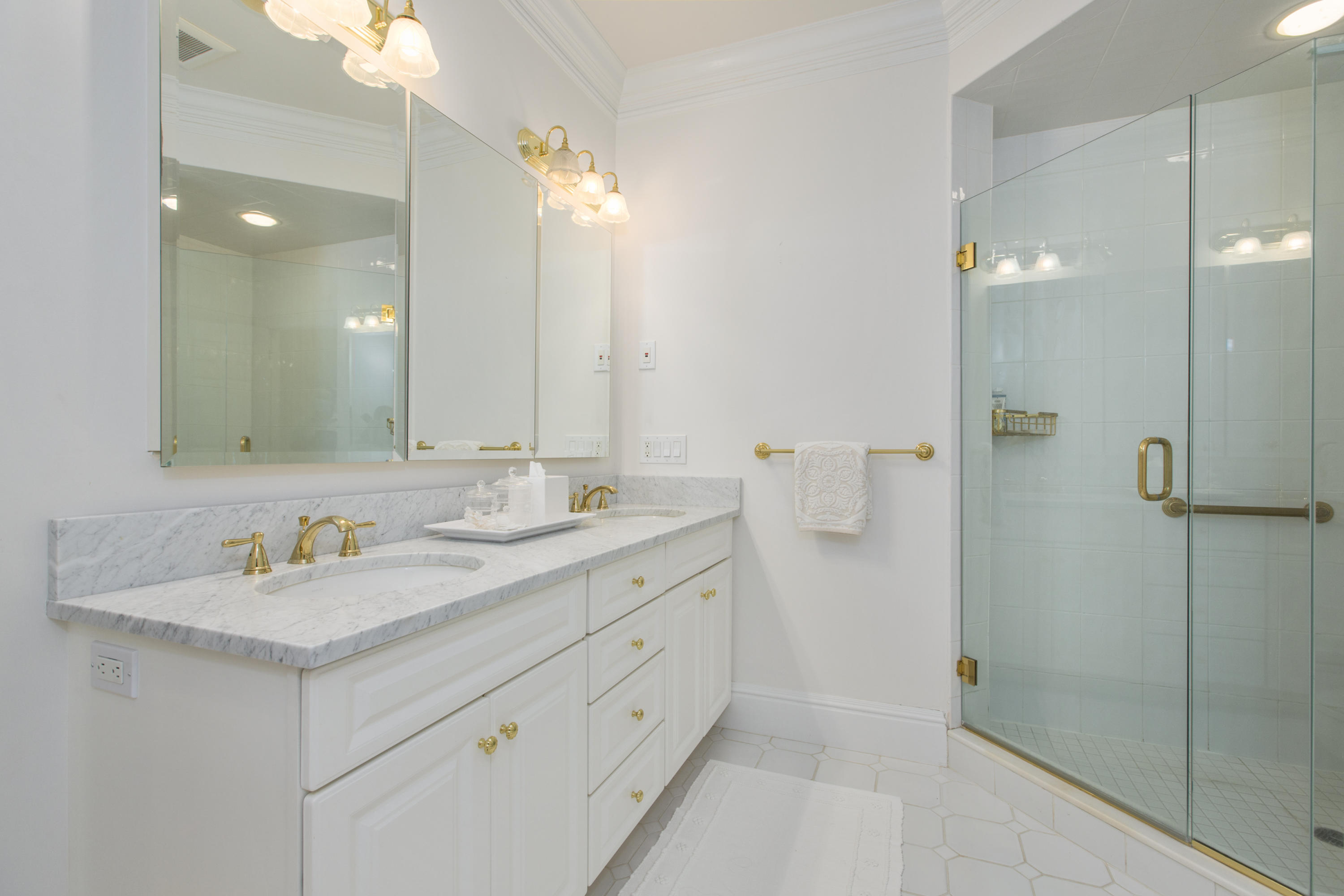 30 Richmond Hill Road, Unit 4 New Canaan, CT 06840 - Photo 25 of 40 a bathroom with a double vanity sink mirror and shower