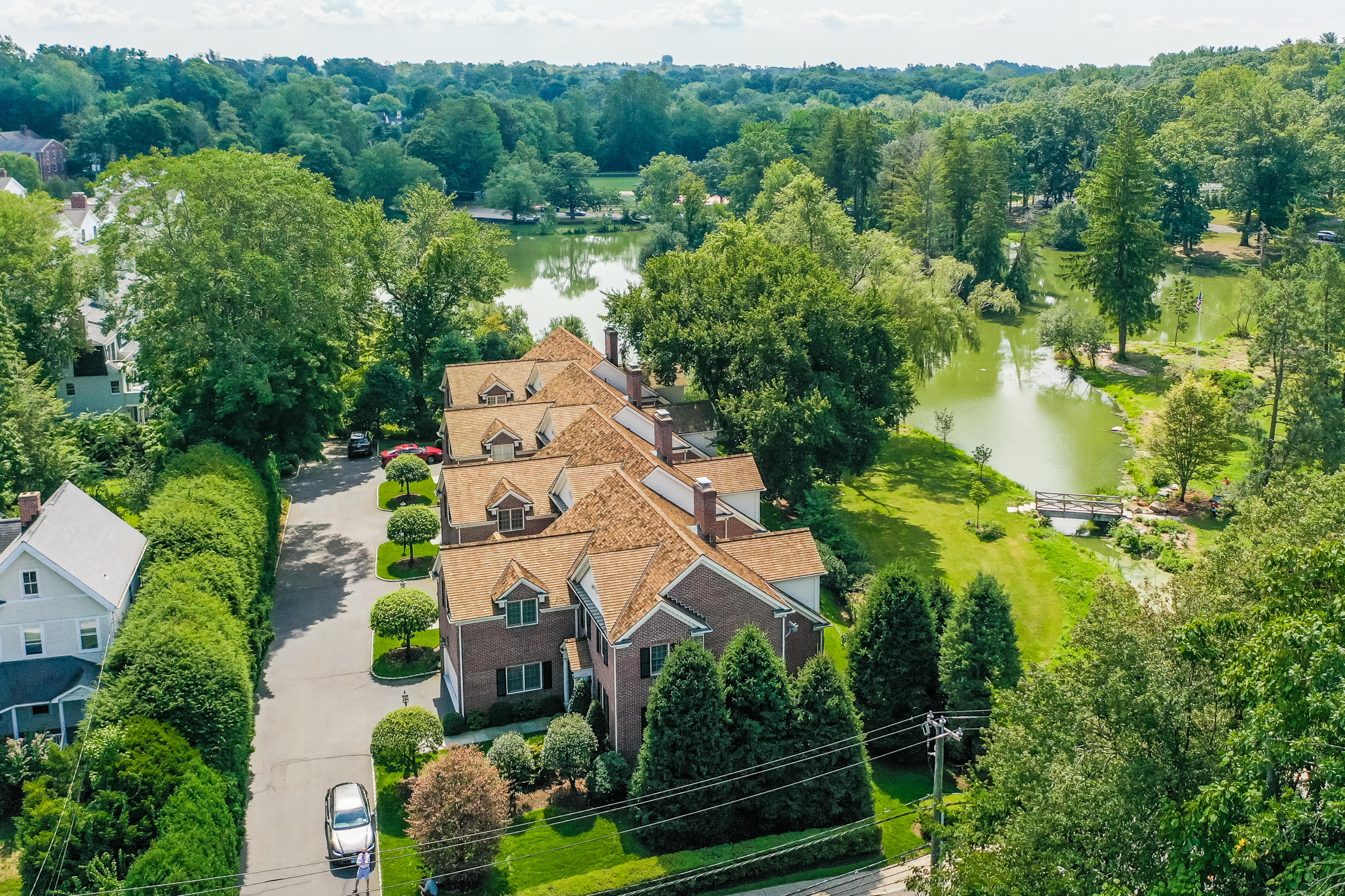 30 Richmond Hill Road, Unit 4 New Canaan, CT 06840 - Photo 3 of 40 an aerial view of house with yard swimming pool and outdoor seating