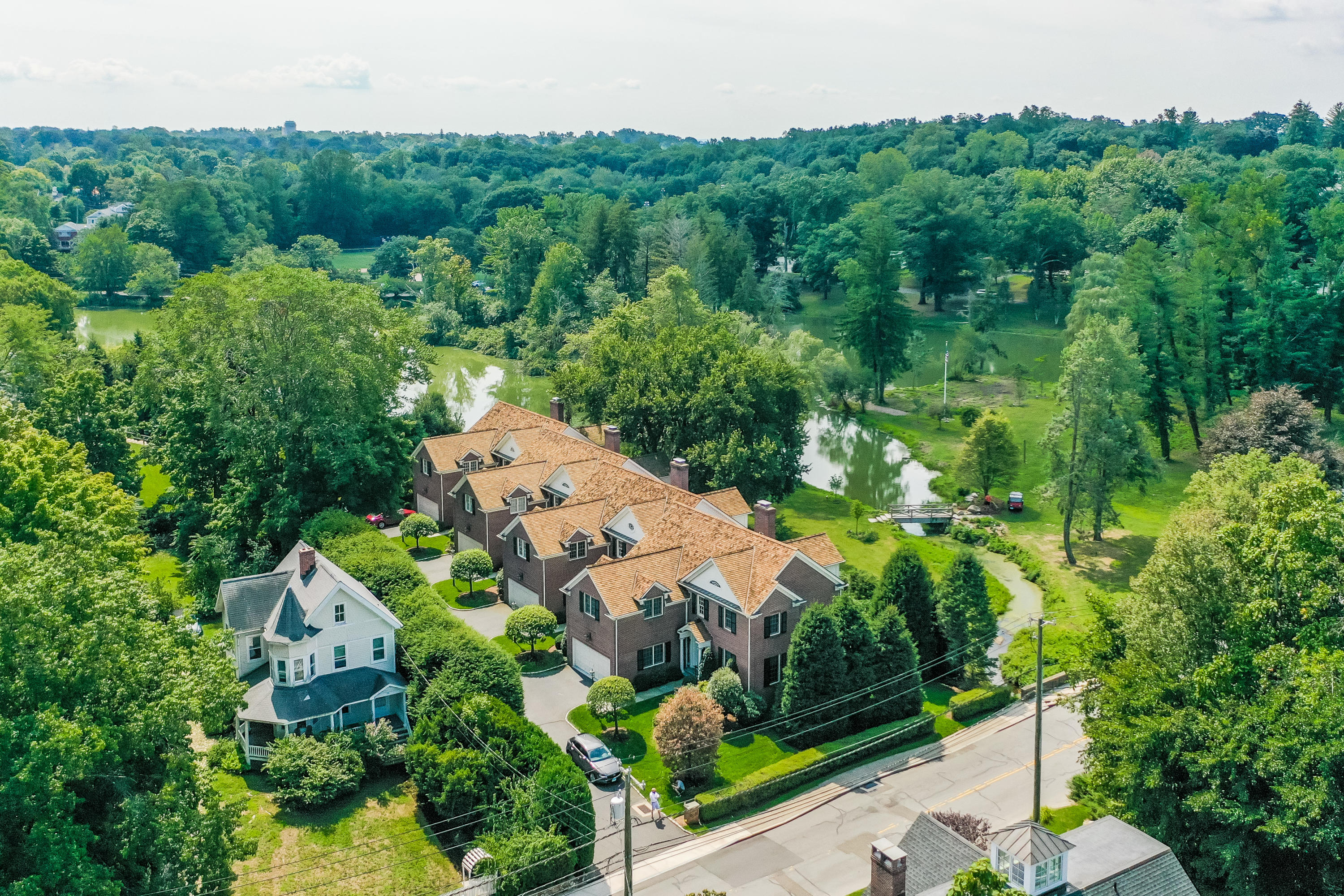 30 Richmond Hill Road, Unit 4 New Canaan, CT 06840 - Photo 40 of 40 an aerial view of a house with a yard