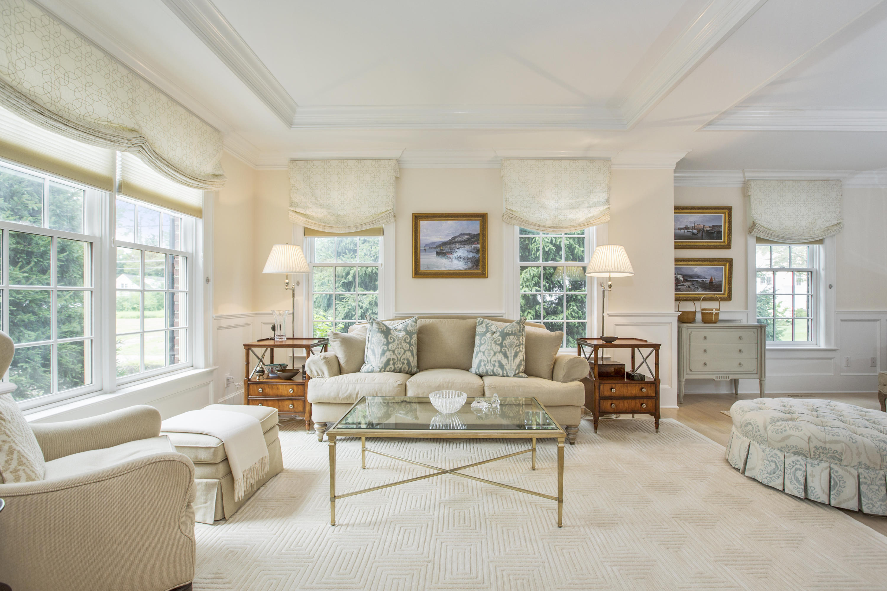30 Richmond Hill Road, Unit 4 New Canaan, CT 06840 - Photo 9 of 40 a living room with furniture and a large window