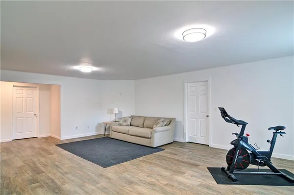 a bedroom with a bed and furniture