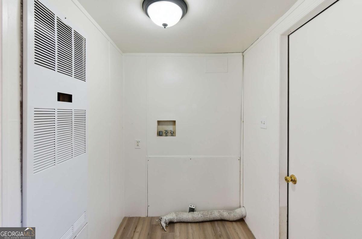 129 Rising Fawn Trail Northeast Rome, GA 30165 - Photo 19 of 25 a view of a livingroom with wooden floor
