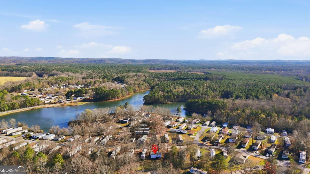 129 Rising Fawn Trail Northeast Rome, GA 30165 - Photo 25 of 25 a view of a lake with a mountain