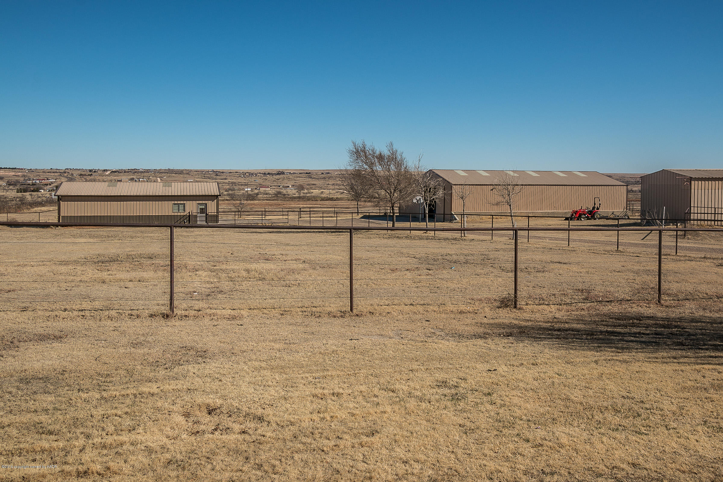 311 Deahl Road Fritch, TX 79036 - Photo 28 of 46 027_Barn Area From Back Porch