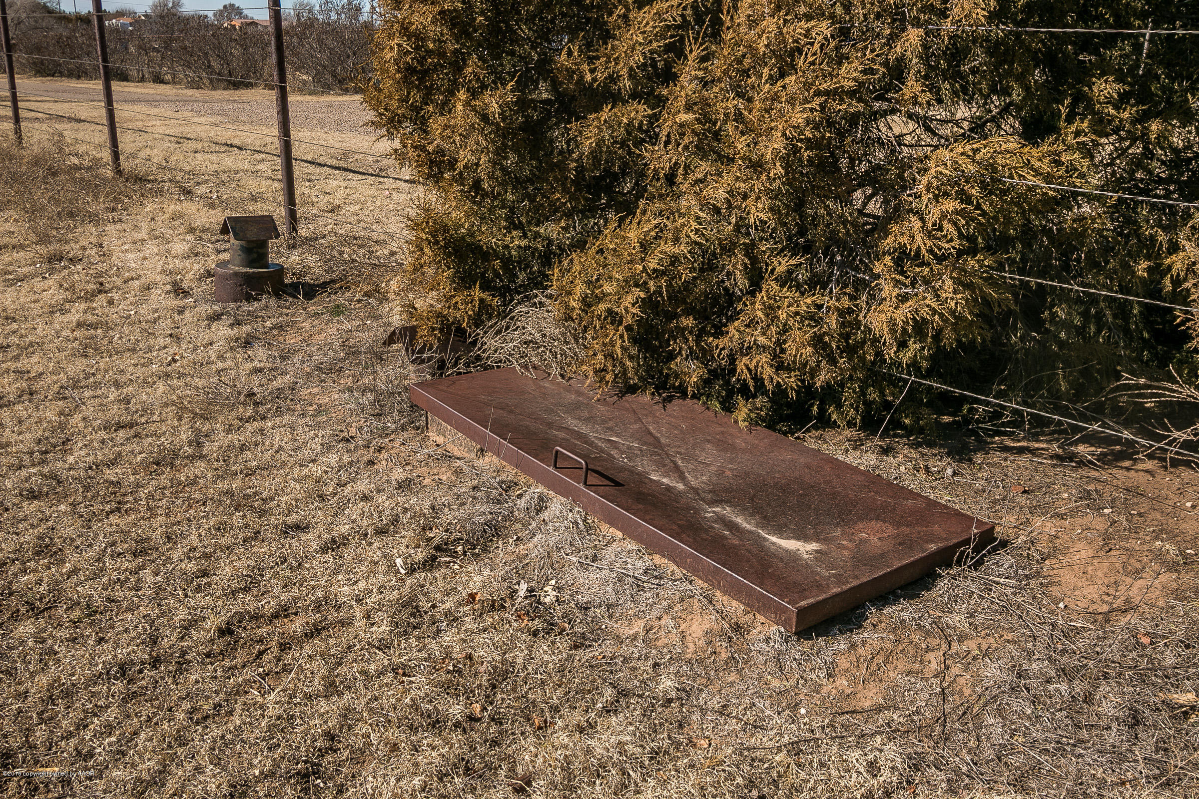 311 Deahl Road Fritch, TX 79036 - Photo 41 of 46 040_Storm Shelter