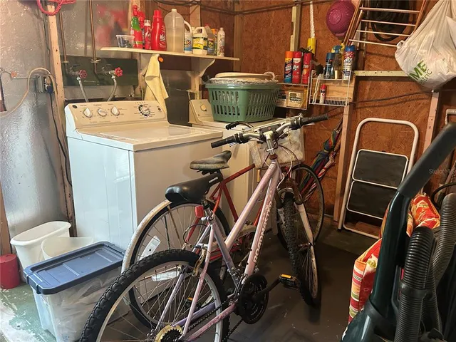 a storage room with washer and dryer