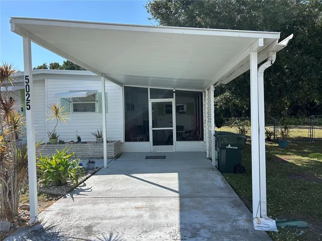a view of a entryway door front of house