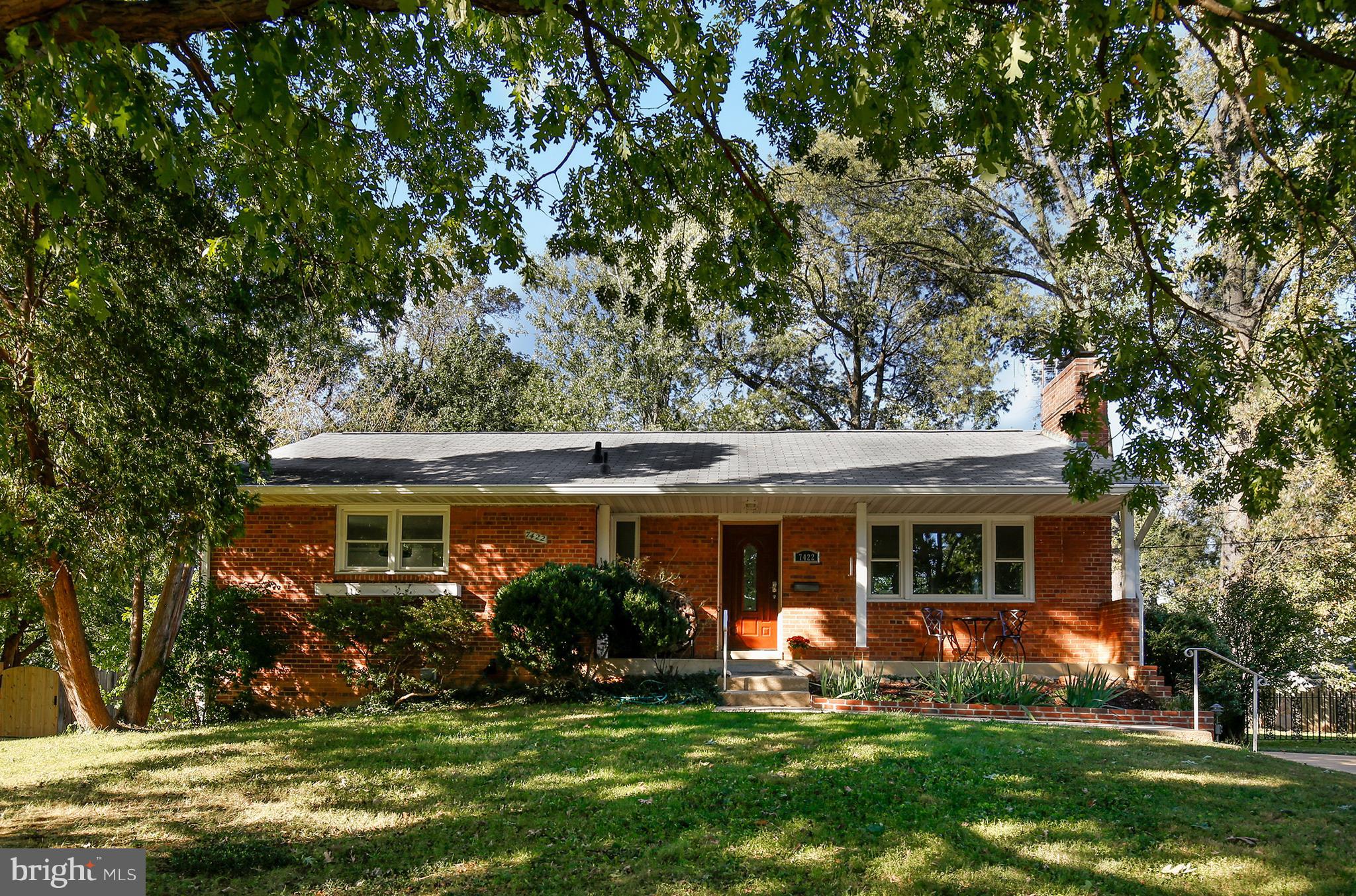 7422 Dunston Street Springfield, VA 22151 - Photo 1 of 30 front view of a house with a yard