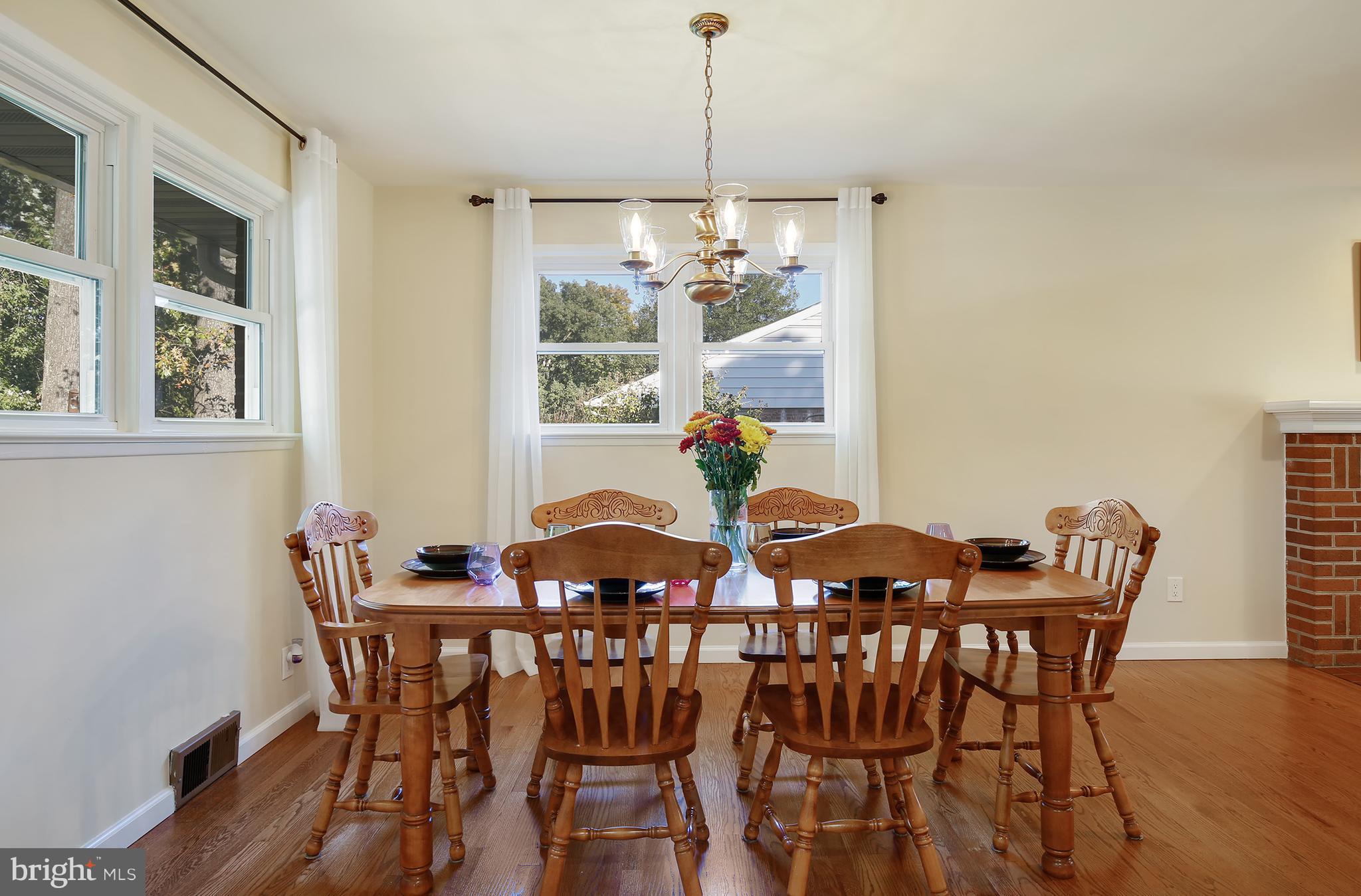 7422 Dunston Street Springfield, VA 22151 - Photo 14 of 30 a view of a dining room with furniture and window