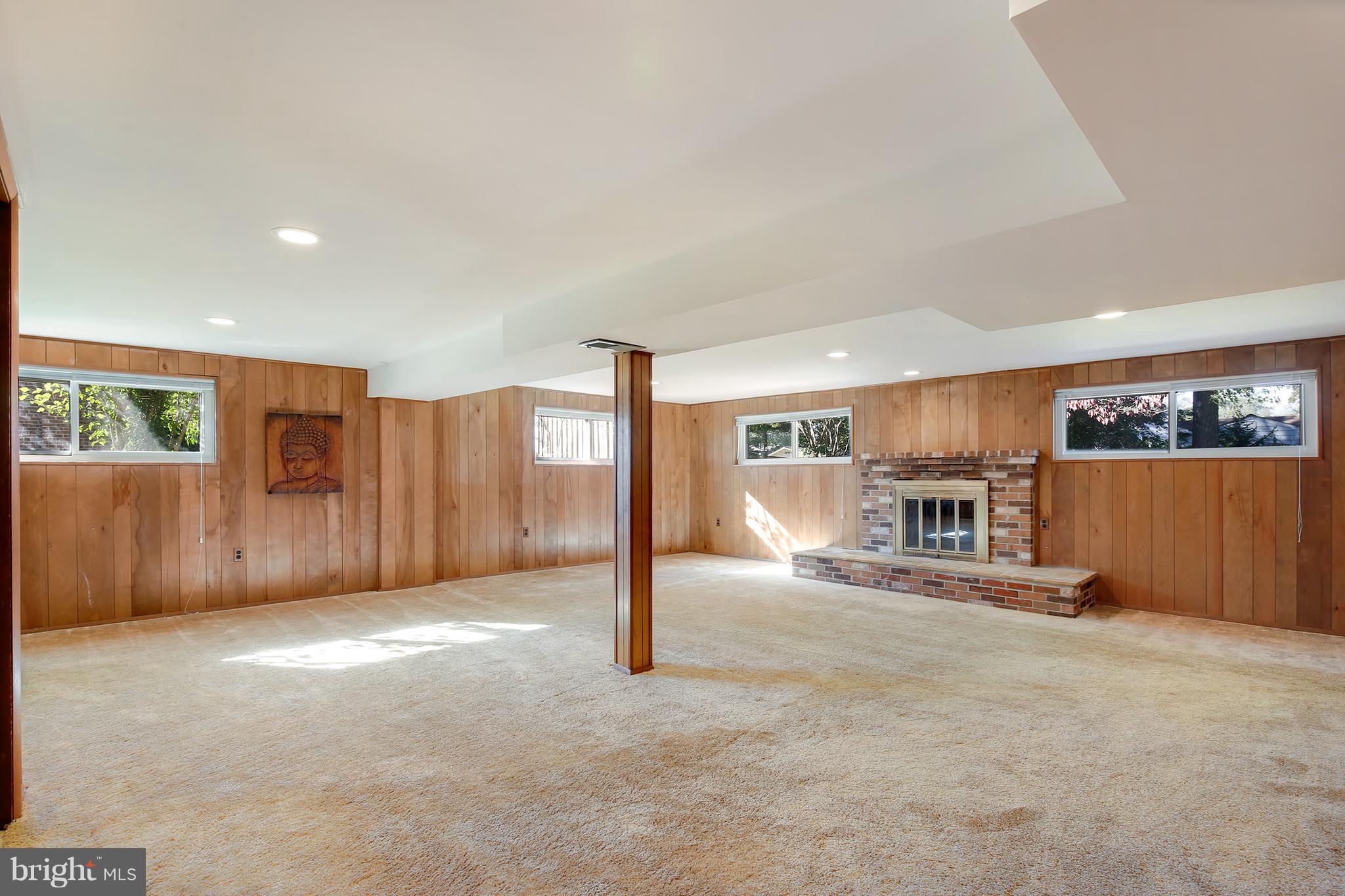 7422 Dunston Street Springfield, VA 22151 - Photo 25 of 30 a view of a livingroom with furniture and a ceiling fan