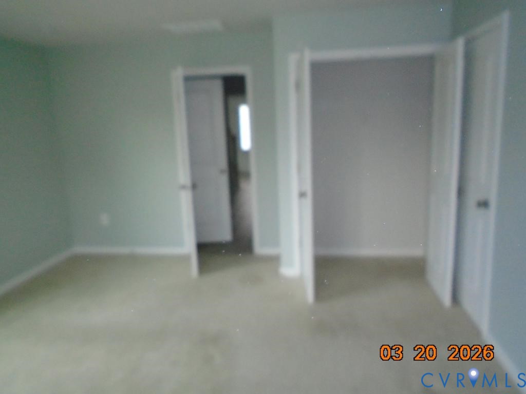 645 Rivanna Hill Road Glen Allen, VA 23060 - Photo 8 of 25 Unfurnished bedroom featuring baseboards