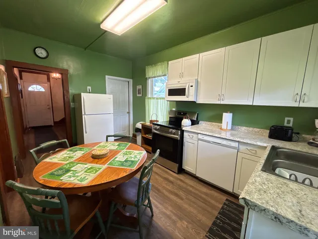 a view of a house with a park