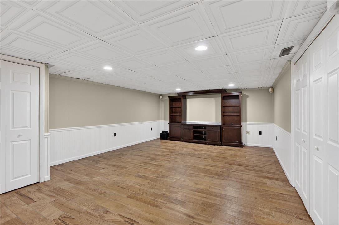 1371 Stoke Park Road Bethlehem, PA 18017 - Photo 50 of 55 a view of an empty room with wooden floor