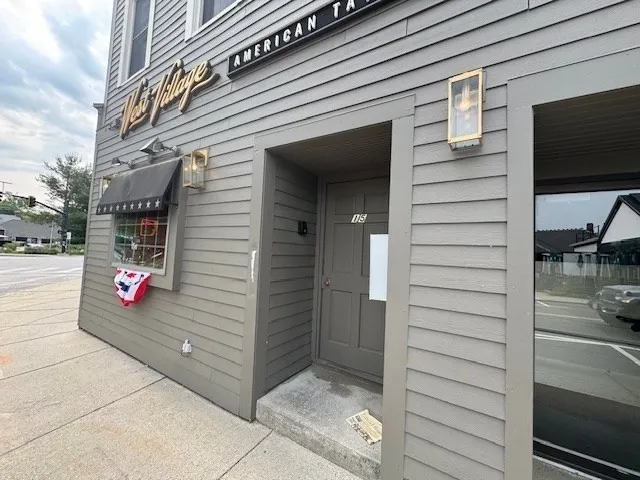 a sign on the side of a building