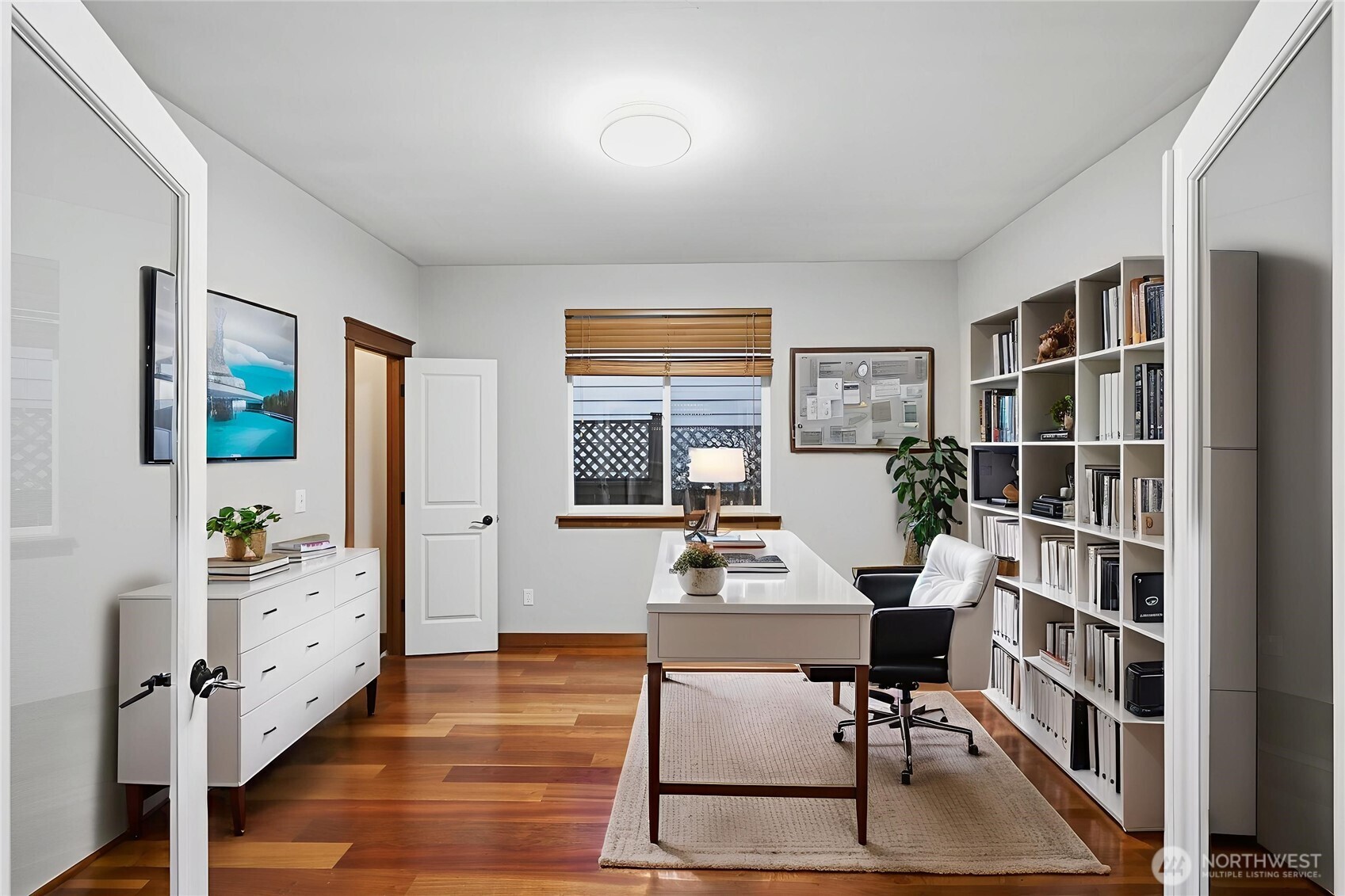 18408 41st Drive Southeast Bothell, WA 98012 - Photo 12 of 25 a workspace with furniture bookshelf and a window
