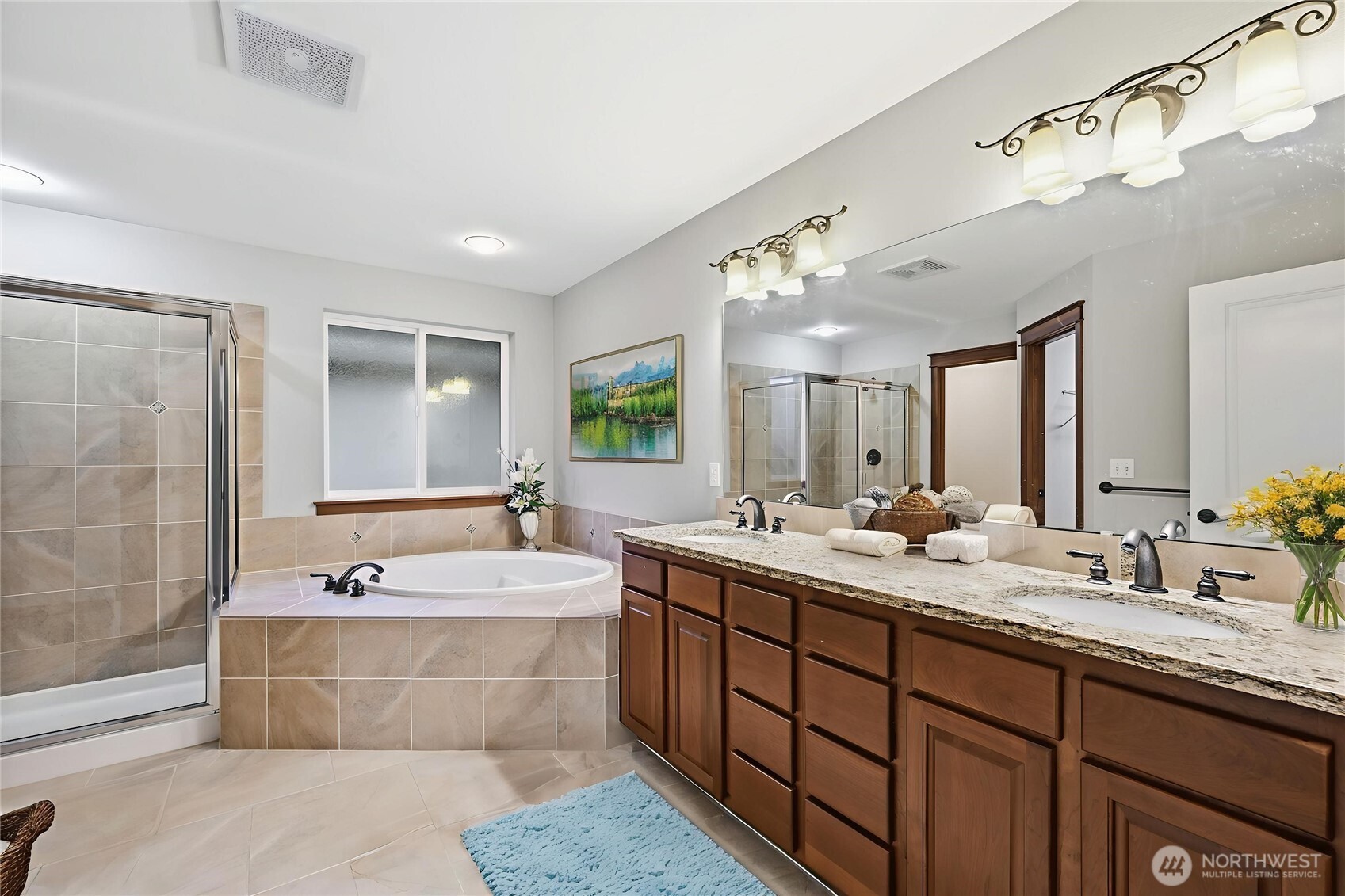 18408 41st Drive Southeast Bothell, WA 98012 - Photo 18 of 25 a bathroom with a large tub double vanity sink and a mirror