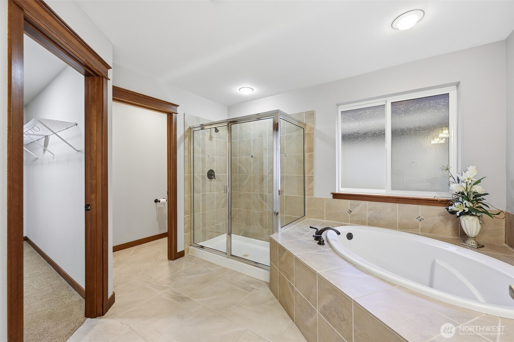 18408 41st Drive Southeast Bothell, WA 98012 - Photo 19 of 25 a bathroom with a bathtub and shower
