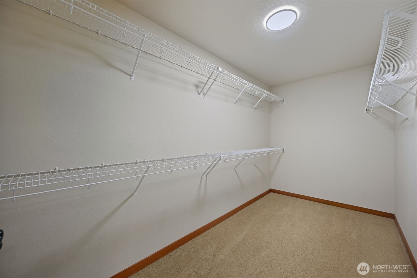18408 41st Drive Southeast Bothell, WA 98012 - Photo 20 of 25 a view of a room with racks on the wall