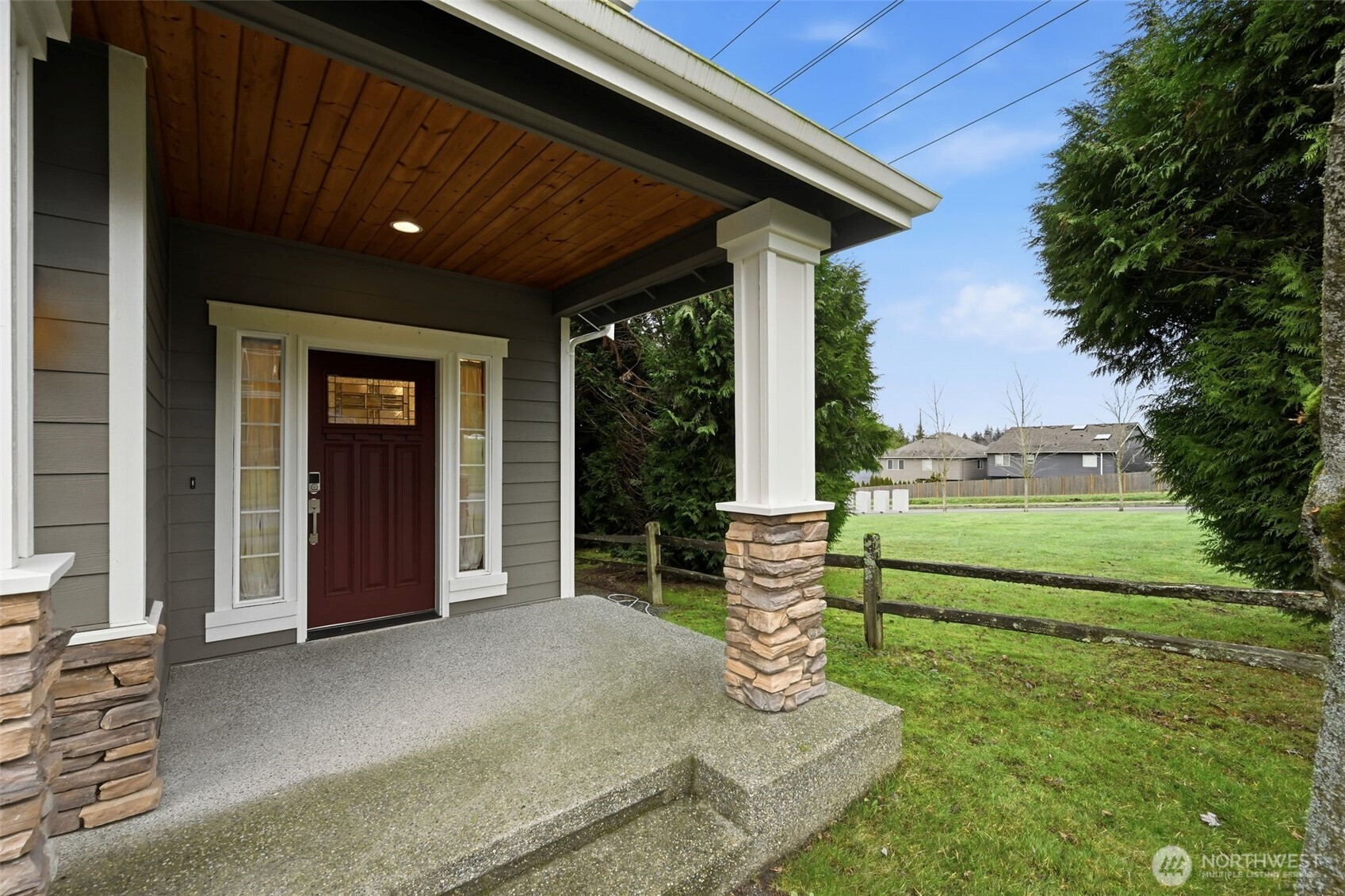 18408 41st Drive Southeast Bothell, WA 98012 - Photo 2 of 25 a front view of a house with a garden