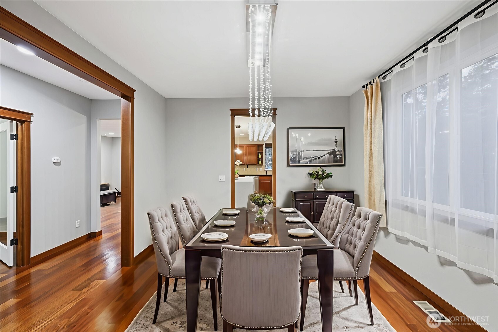 18408 41st Drive Southeast Bothell, WA 98012 - Photo 10 of 25 a view of a dining room with furniture window and wooden floor