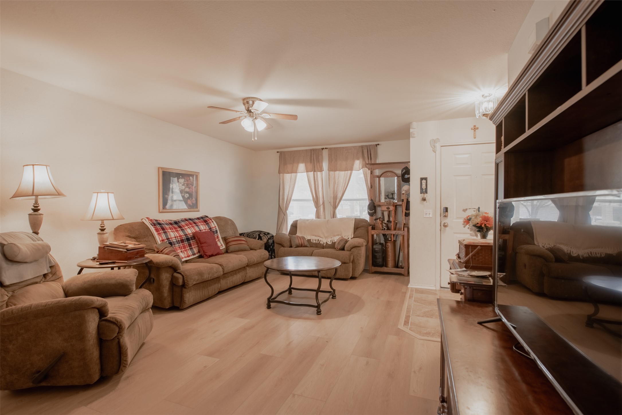 5501 English Avenue Austin, TX 78724 - Photo 2 of 19 a living room with furniture and a flat screen tv