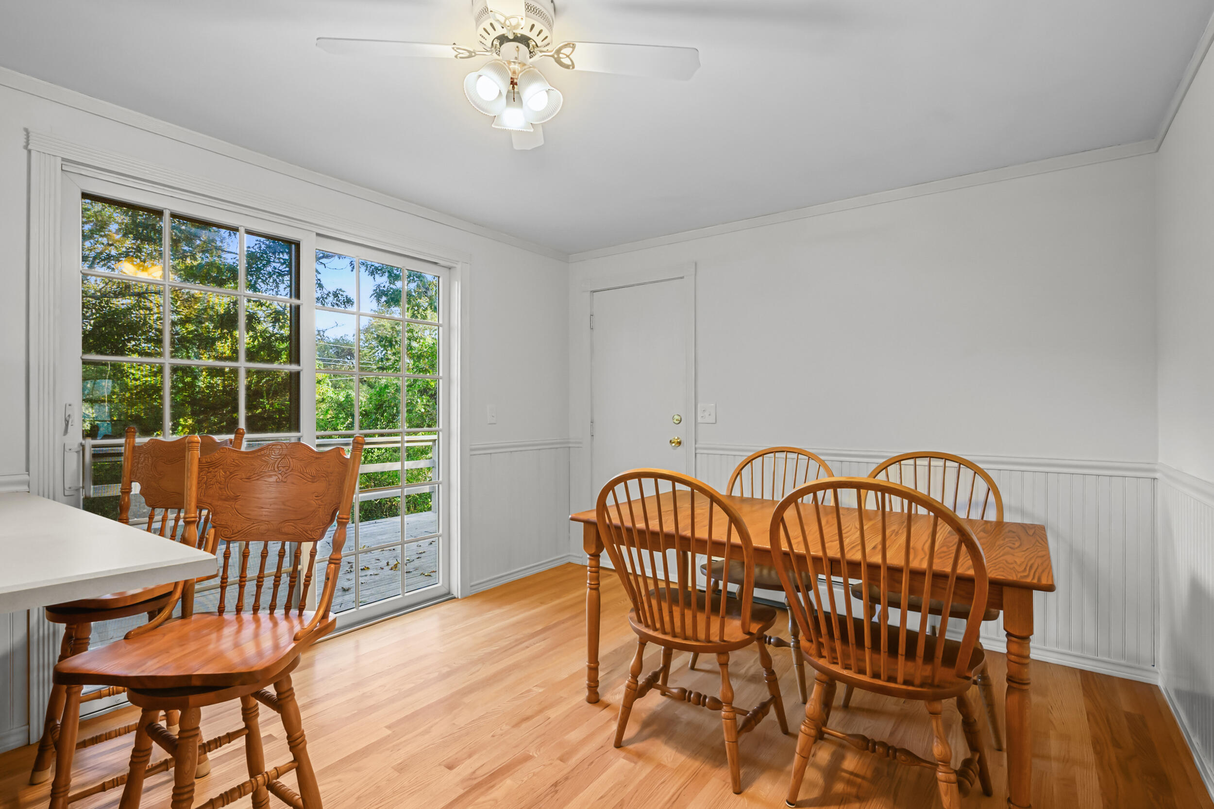 370 Compass Circle Hyannis, MA 02601 - Photo 12 of 26 a view of a dining room with furniture window and wooden floor