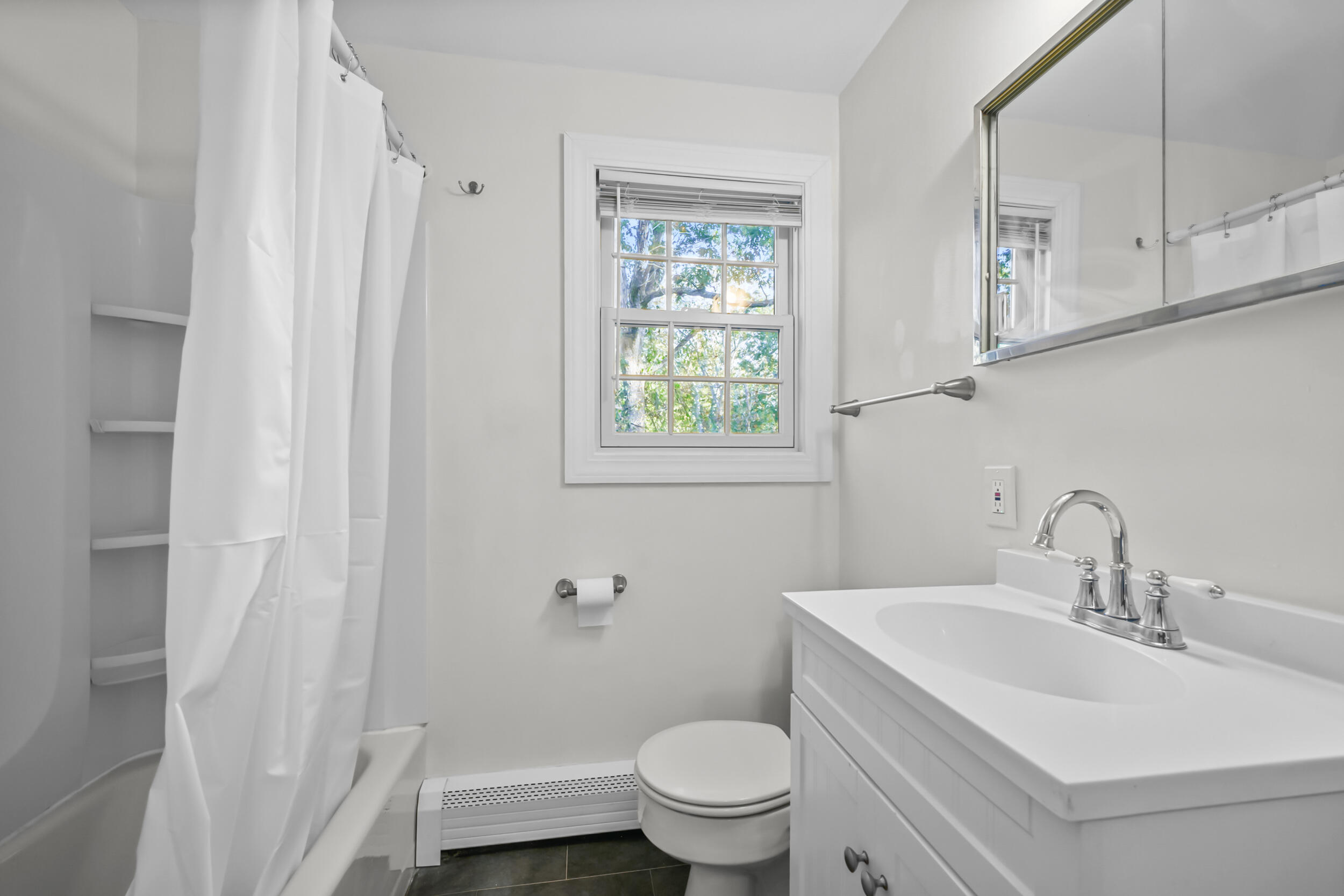 370 Compass Circle Hyannis, MA 02601 - Photo 16 of 26 a bathroom with a sink toilet and vanity