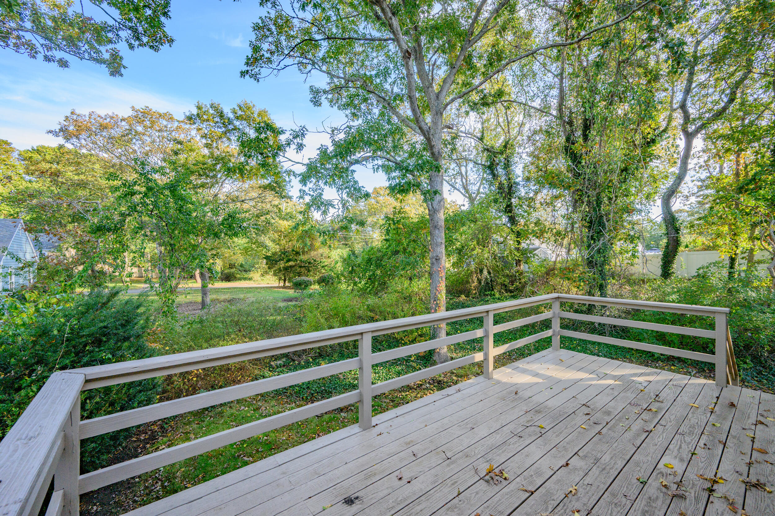 370 Compass Circle Hyannis, MA 02601 - Photo 22 of 26 a view of deck with a large trees