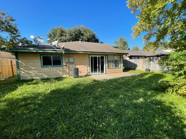 a house view with a garden space