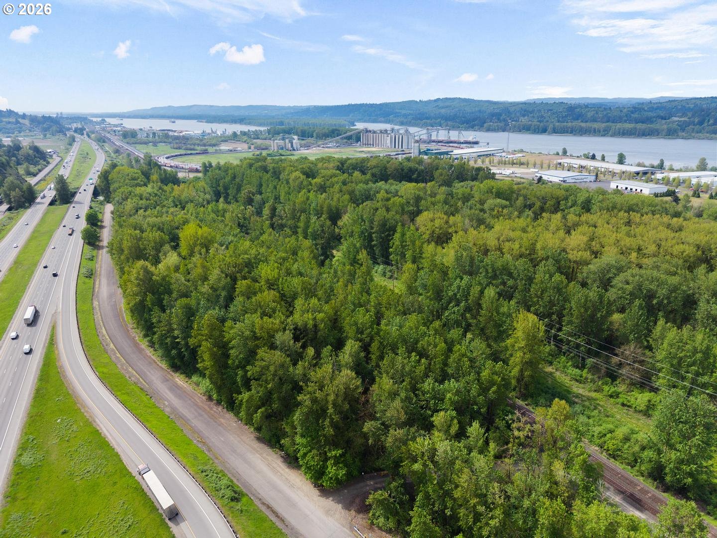 0 Fisherman's Loop Road Kalama, WA 98625 - Photo 7 of 16 a view of a green field with an outdoor space