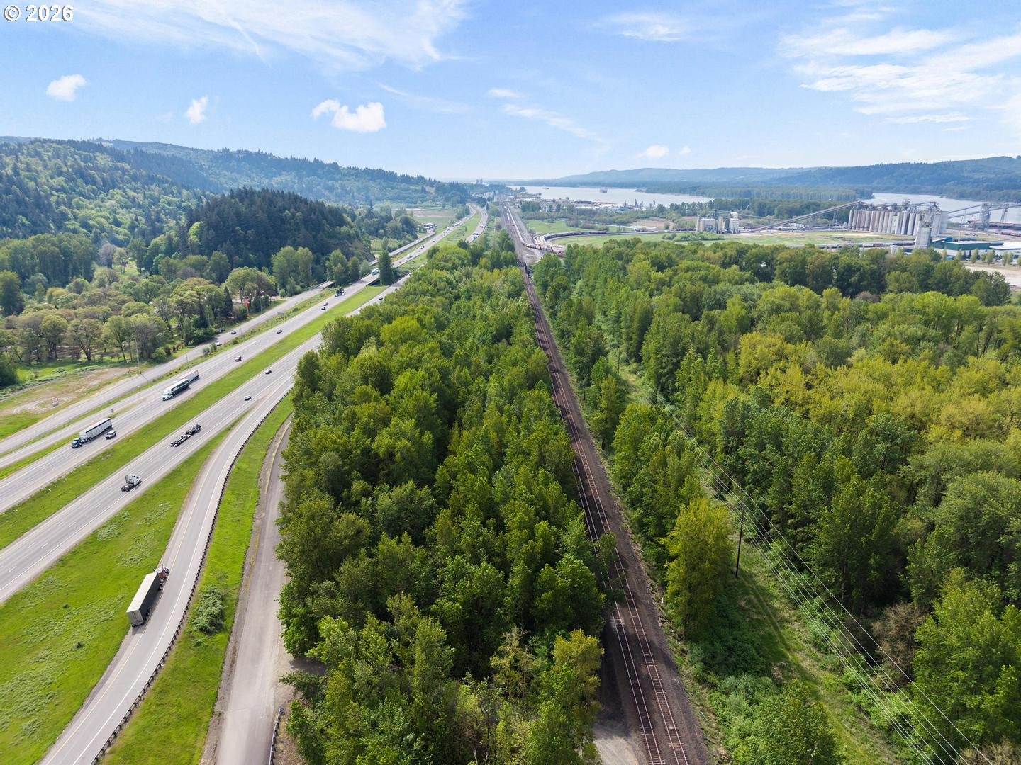 0 Fisherman's Loop Road Kalama, WA 98625 - Photo 8 of 16 a view of a city with lush green forest