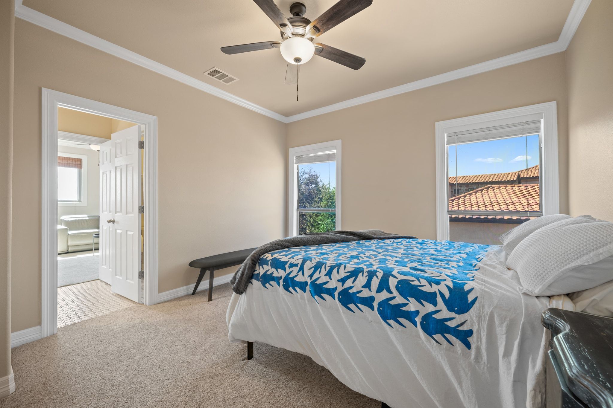 185 Shimmering Shore Court Spring Branch, TX 78070 - Photo 25 of 36 Bedroom with carpet floors, ornamental molding, multiple windows, and ceiling fan