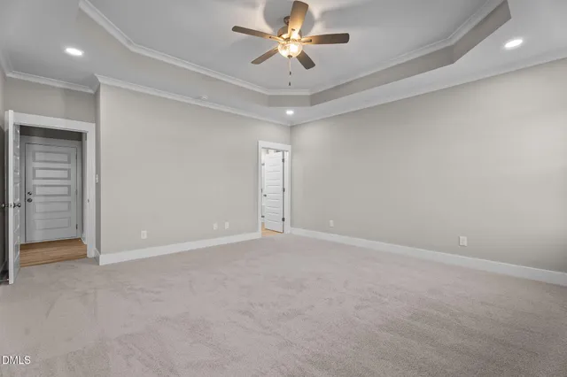 a view of a house with potted plants