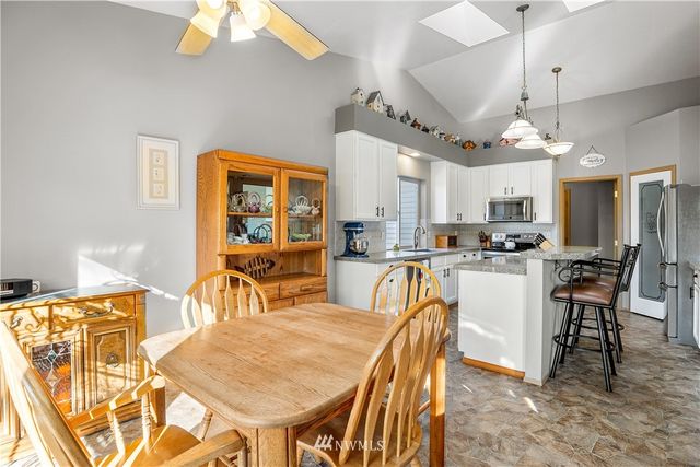 a view of a dining room with furniture