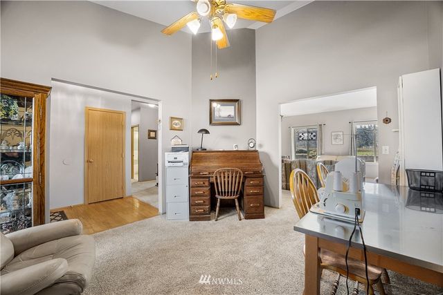 a bedroom with furniture and a chandelier
