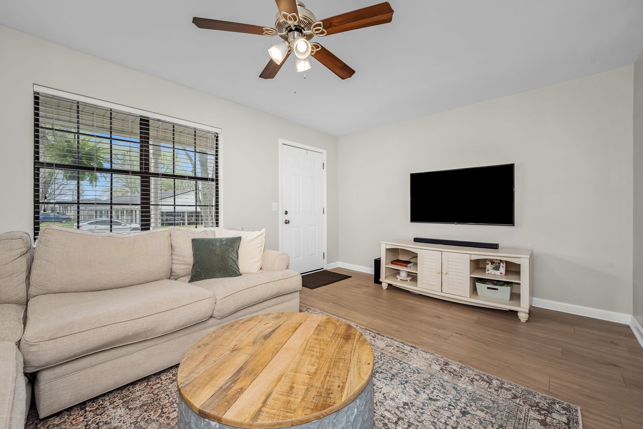 210 Sunset Street Unionville, TN 37180 - Photo 11 of 48 a living room with furniture and a flat screen tv