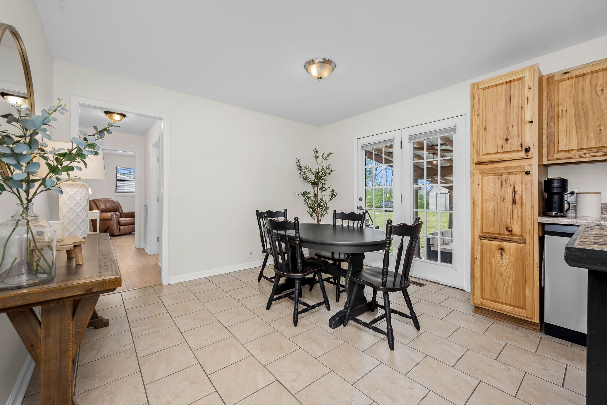 210 Sunset Street Unionville, TN 37180 - Photo 13 of 48 a view of a dining room with furniture and a chandelier