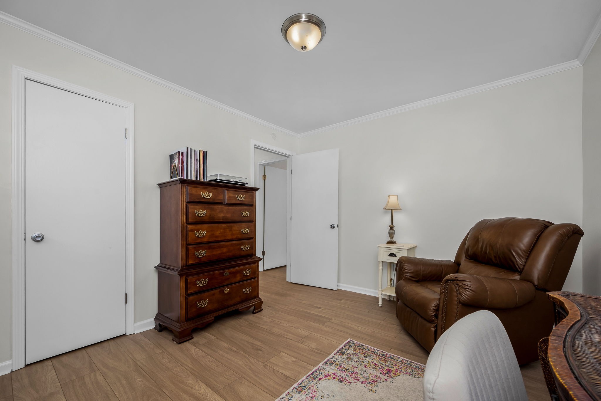 210 Sunset Street Unionville, TN 37180 - Photo 22 of 48 a living room with furniture and wooden floor
